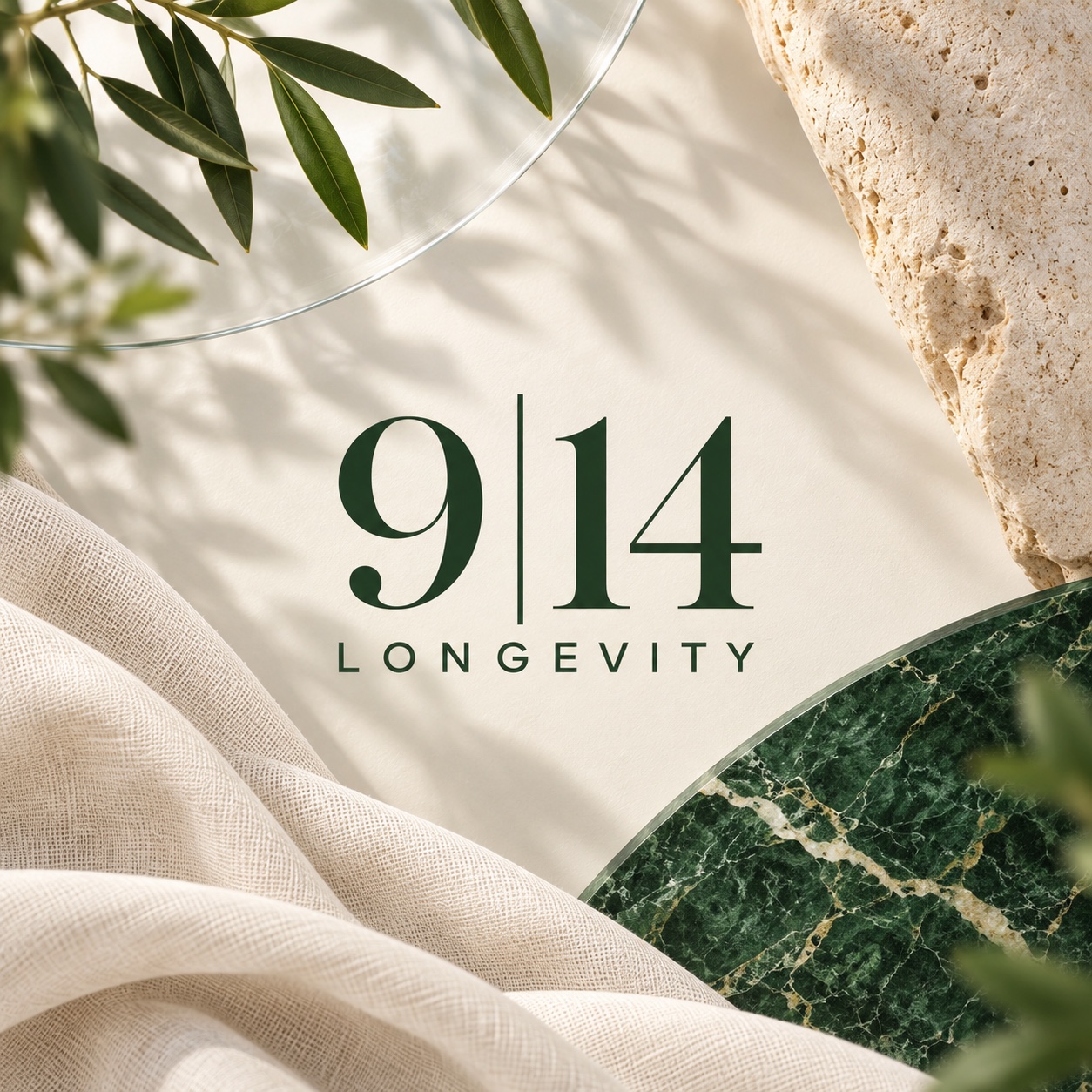 Official 9|14 Longevity signature mark on fine linen with natural stone and green marble